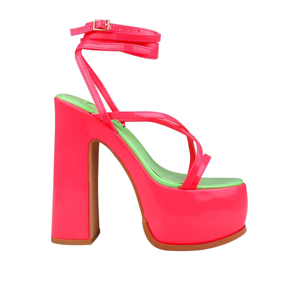 Pink colored women platform heels with straps-side view