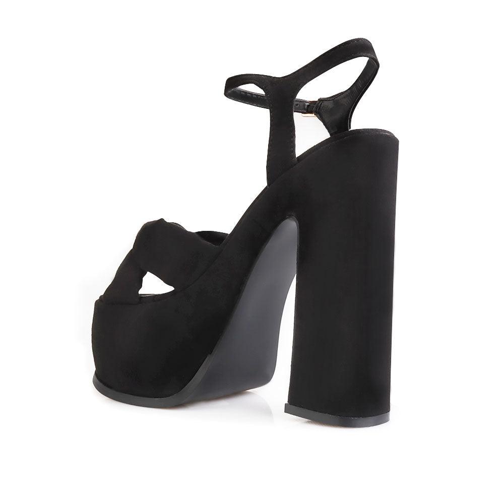 Suede black colored women's platform heels - posterior view