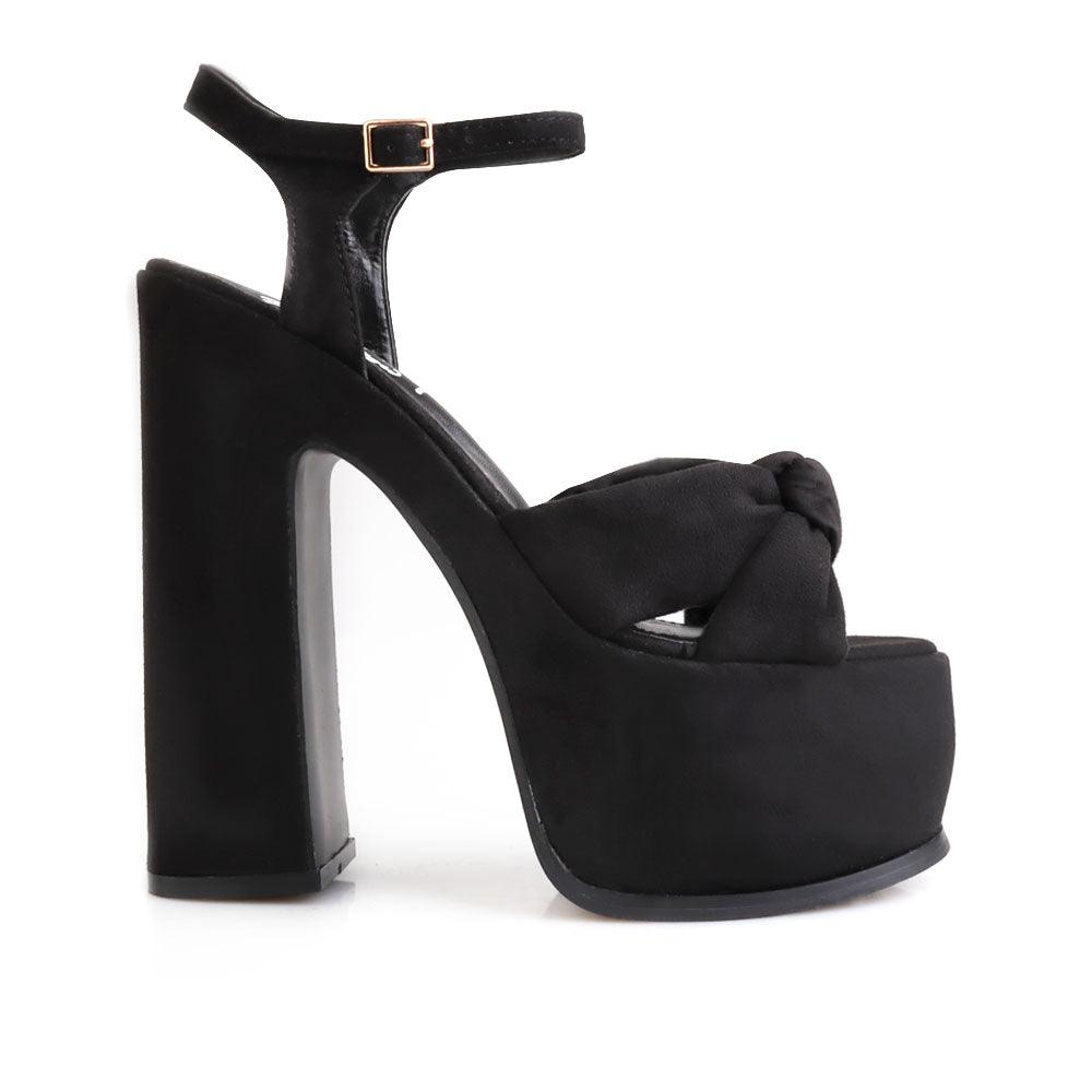 Suede black colored women's platform heels - side view