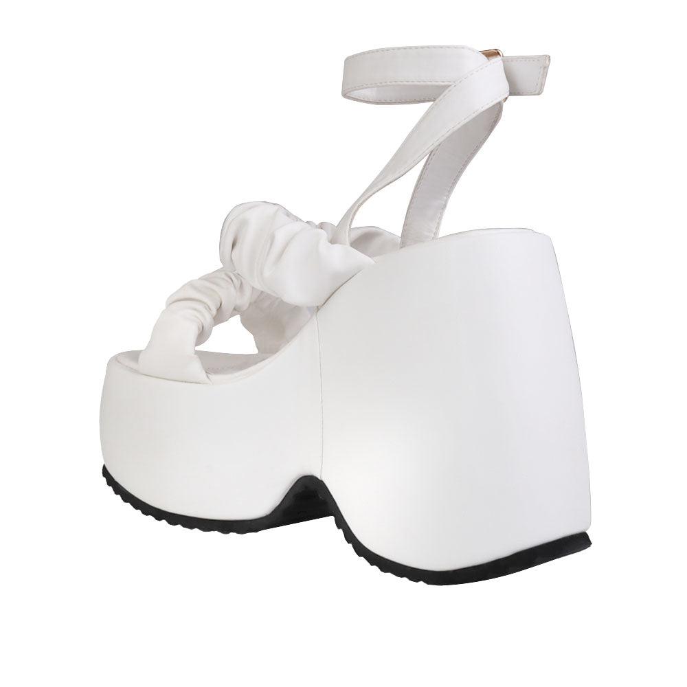 White women's platform with stretchy upper-posterior view