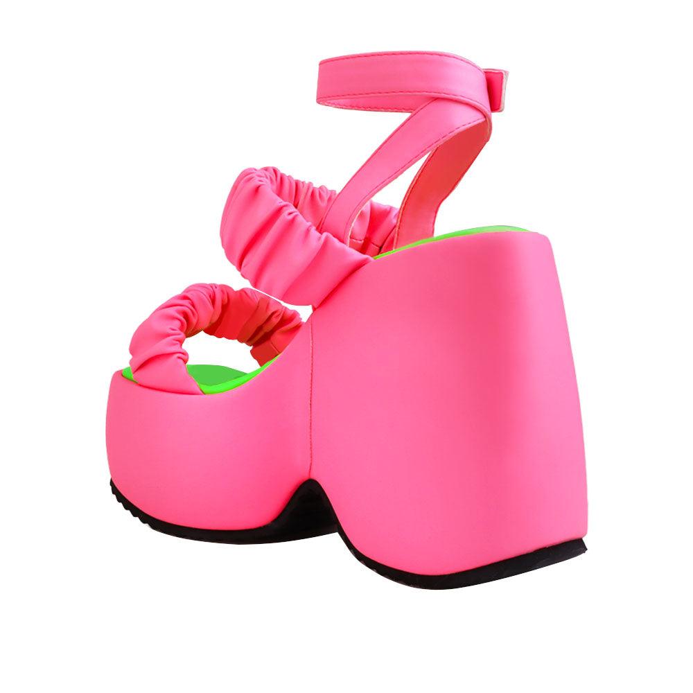 Pink women's platform with stretchy upper-posterior view