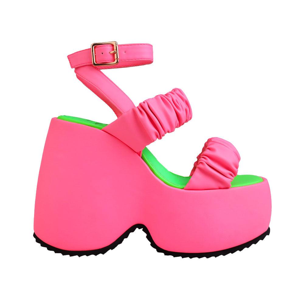 Pink women's platform with stretchy upper-side view