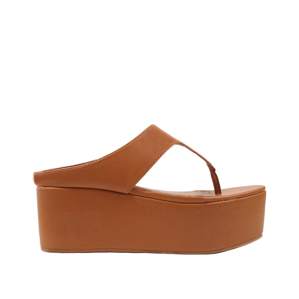 Slip-on women's platform in brown color-side view