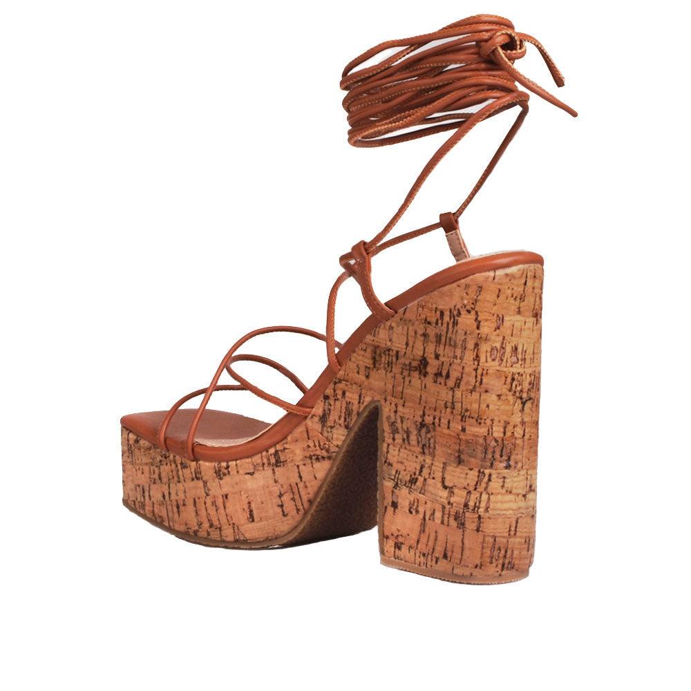 Brown strappy women heels with brown platform-posterior view