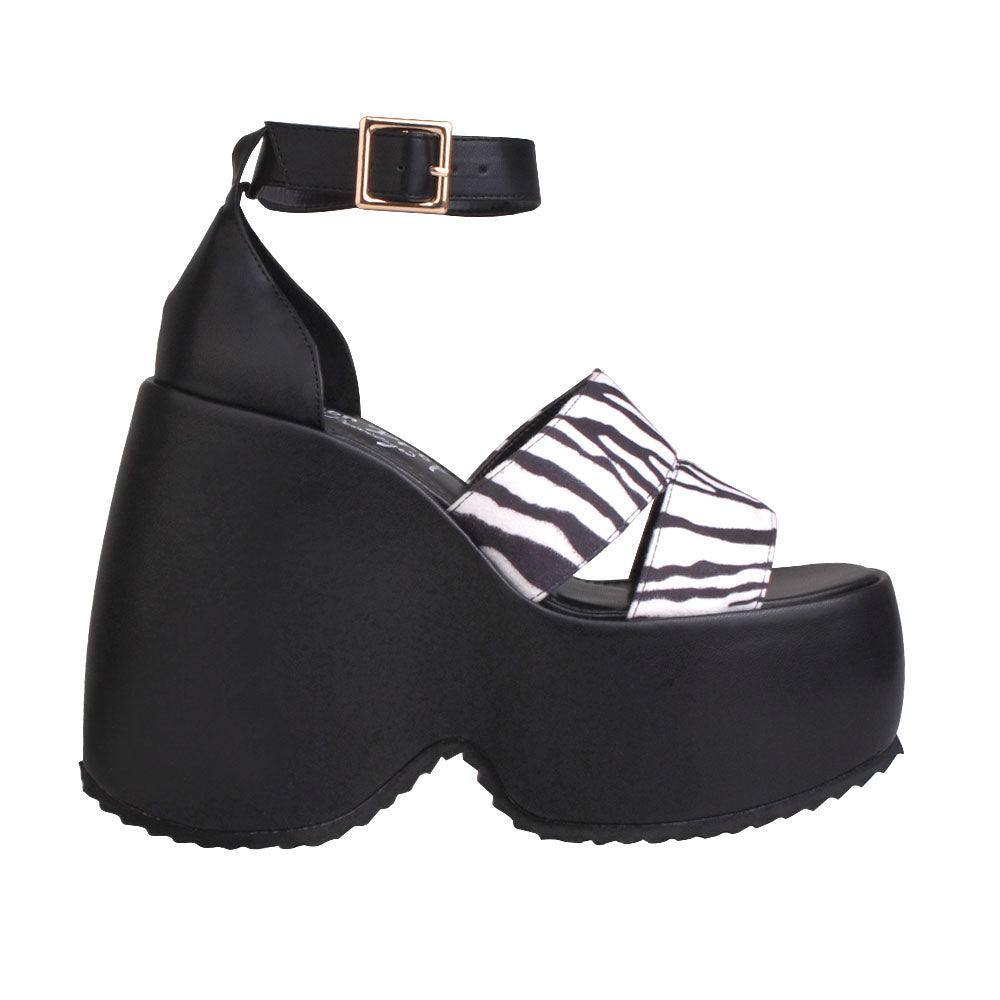 Black colored women platforms with zebra printed upper-side view