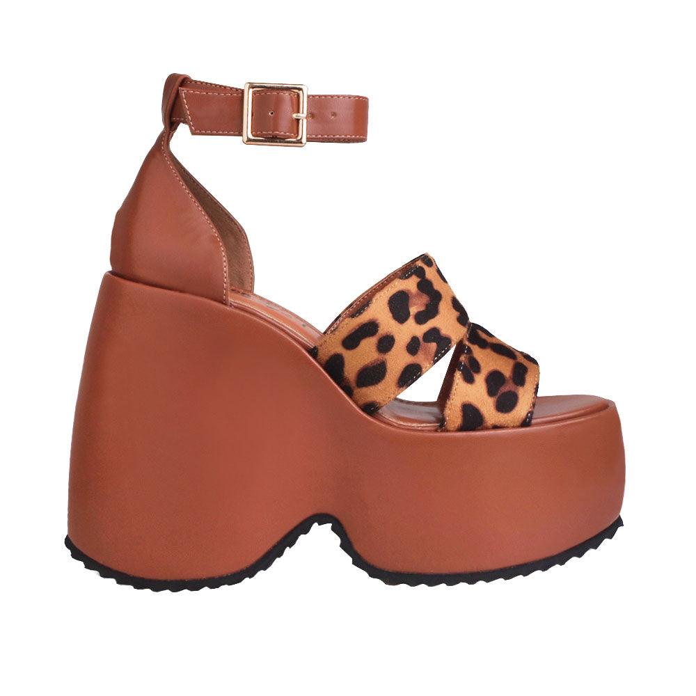 Brown colored women platforms with leopard printed upper-side view