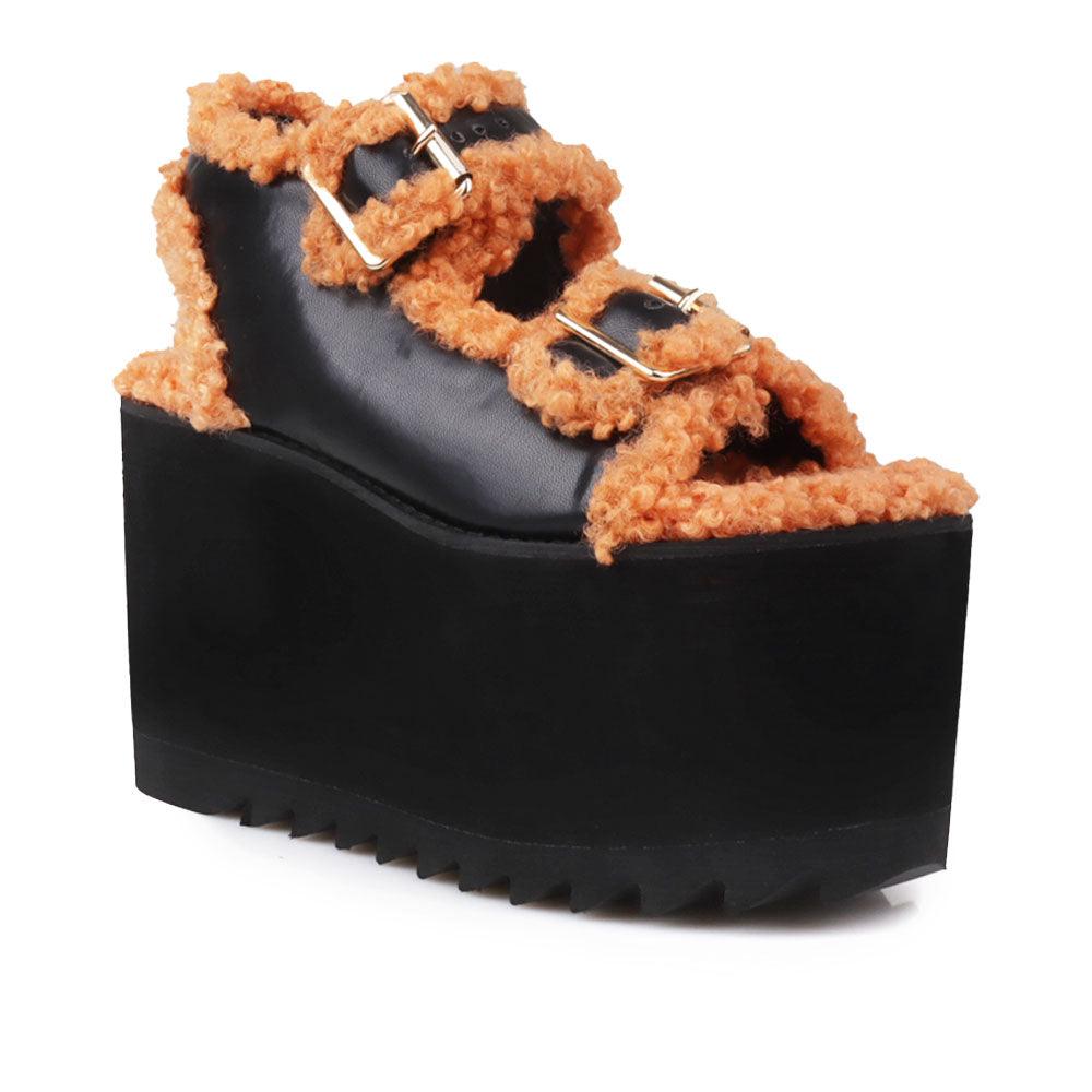 Black colored women platforms with orange fur upper-corner view