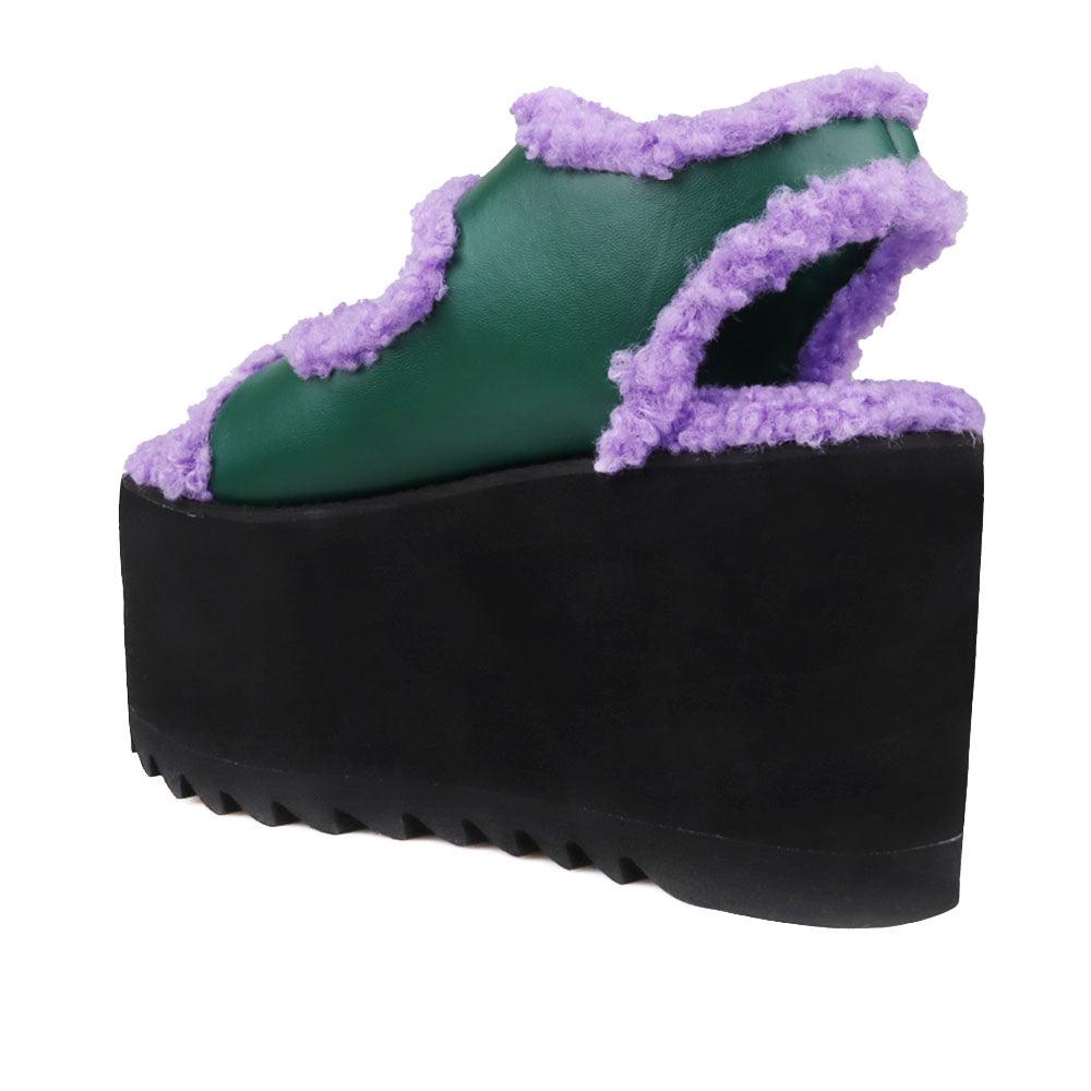 Black colored women platforms with purple fur upper-posterior view