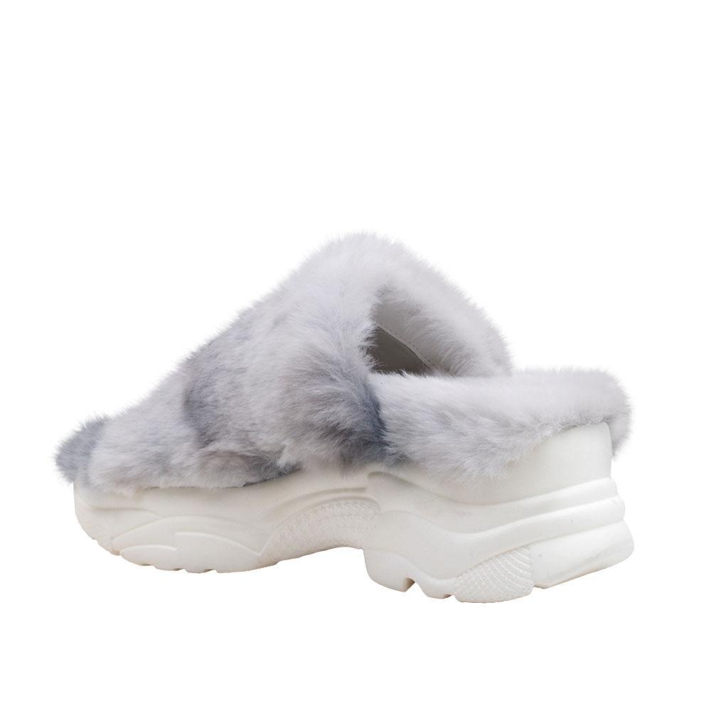 White women fur shoes with white platform-posterior view