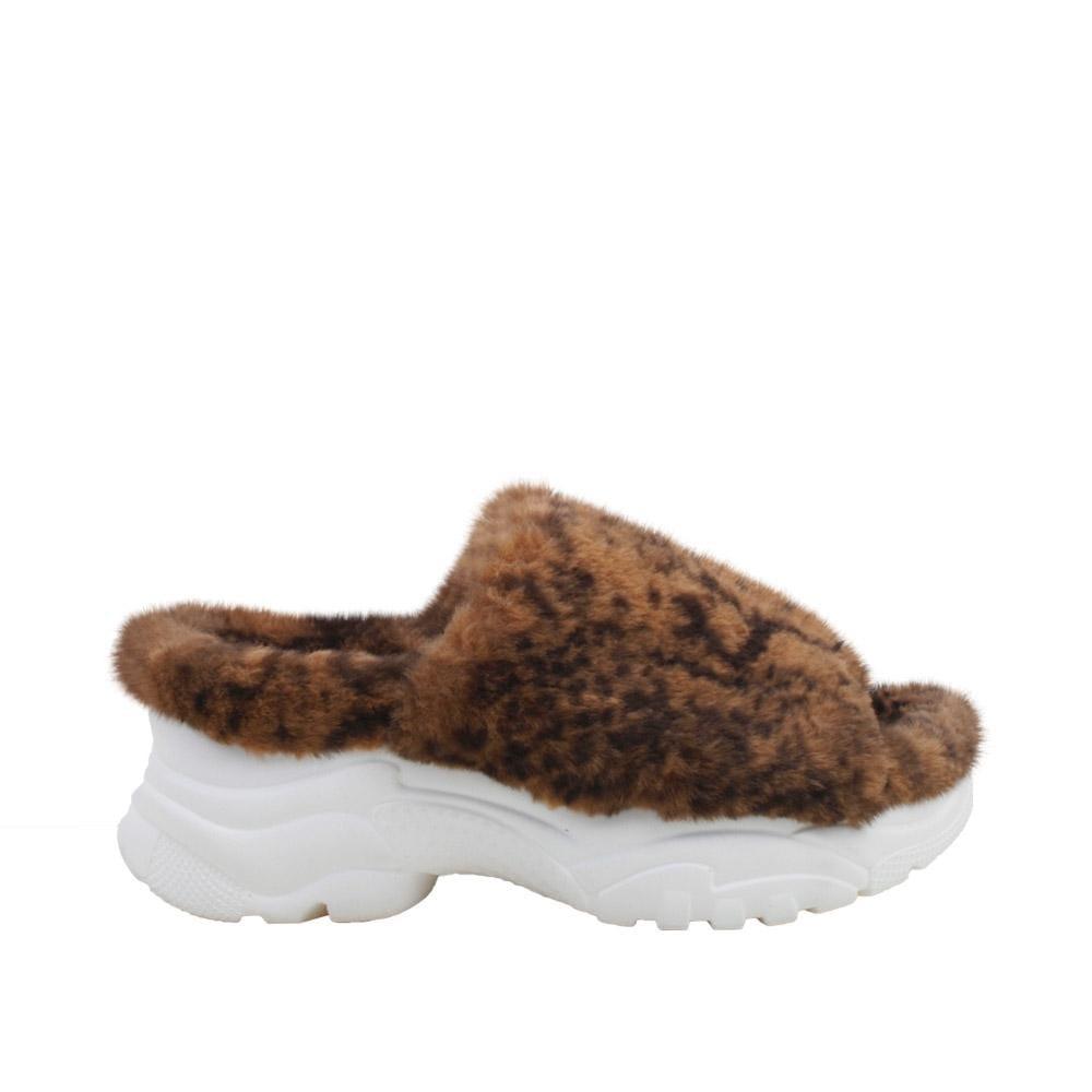 Brown women fur shoes with white platform-side view