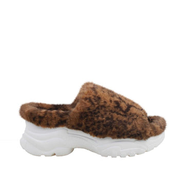 Brown women fur shoes with white platform-side view