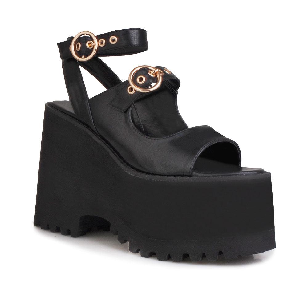 Black women platforms with black bottom and double ankle buckles-corner view