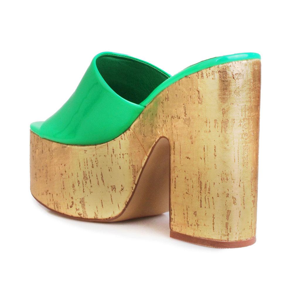 Green women platforms with golden bottom-posterior view