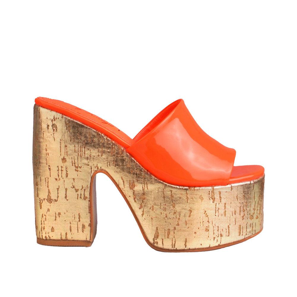 Orange women platforms with golden bottom-side view