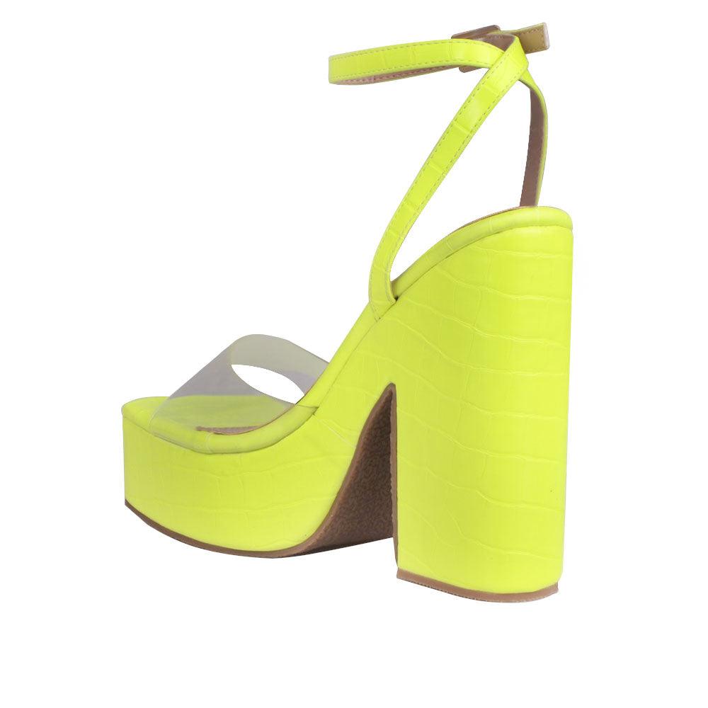 Clear venyl toe strap women's block heel in neon yellow-posterior view