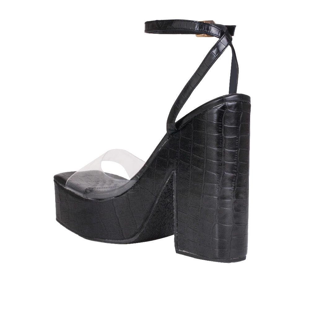 Clear venyl toe strap women's block heel in black-posterior view