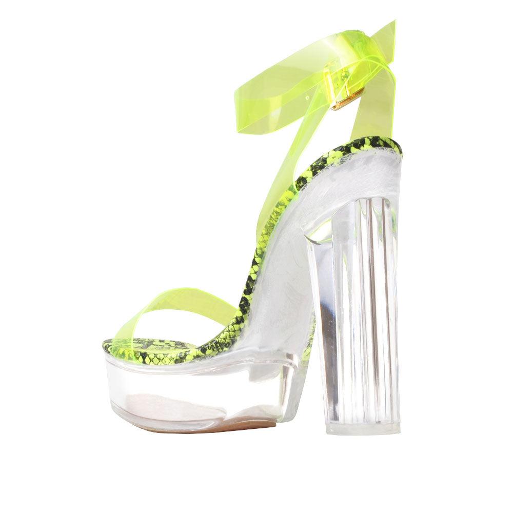 Green colored women block heels with vinyl upper-posterior view