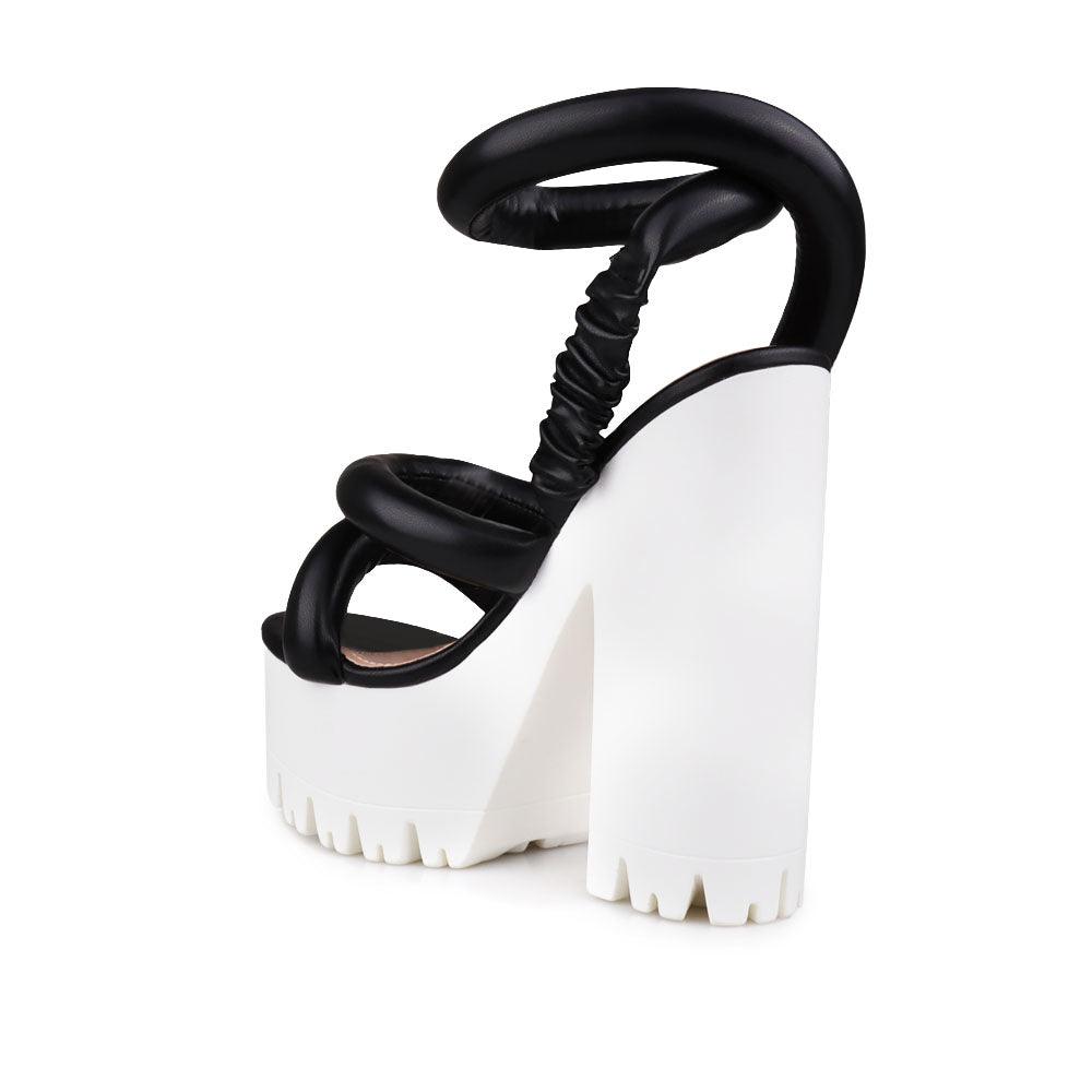 Women sneaker block heel in black-posterior view