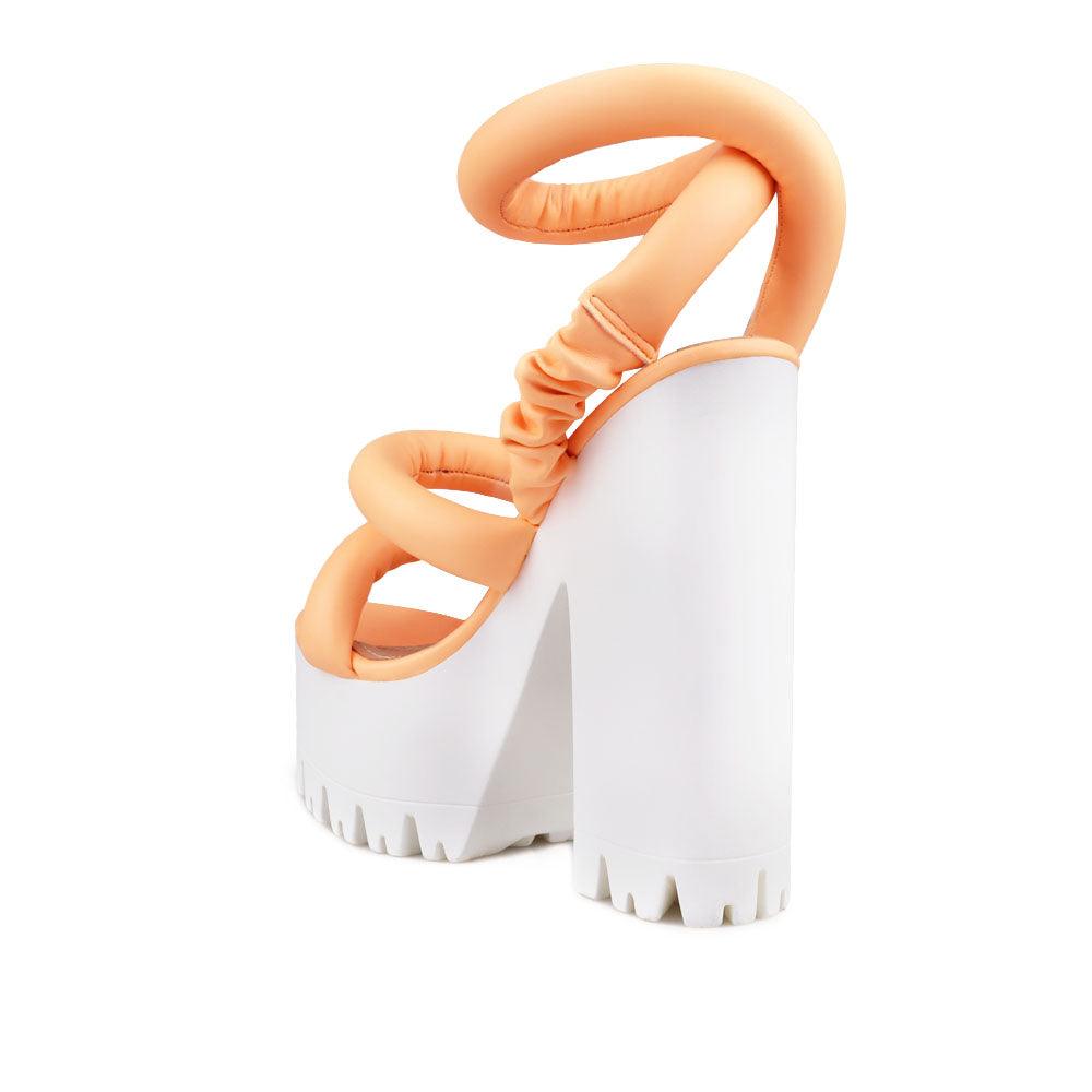 Women sneaker block heel in coral-posterior view