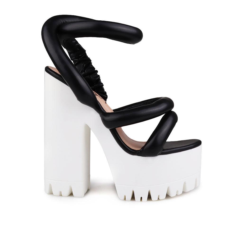 Women sneaker block heel in black-side view