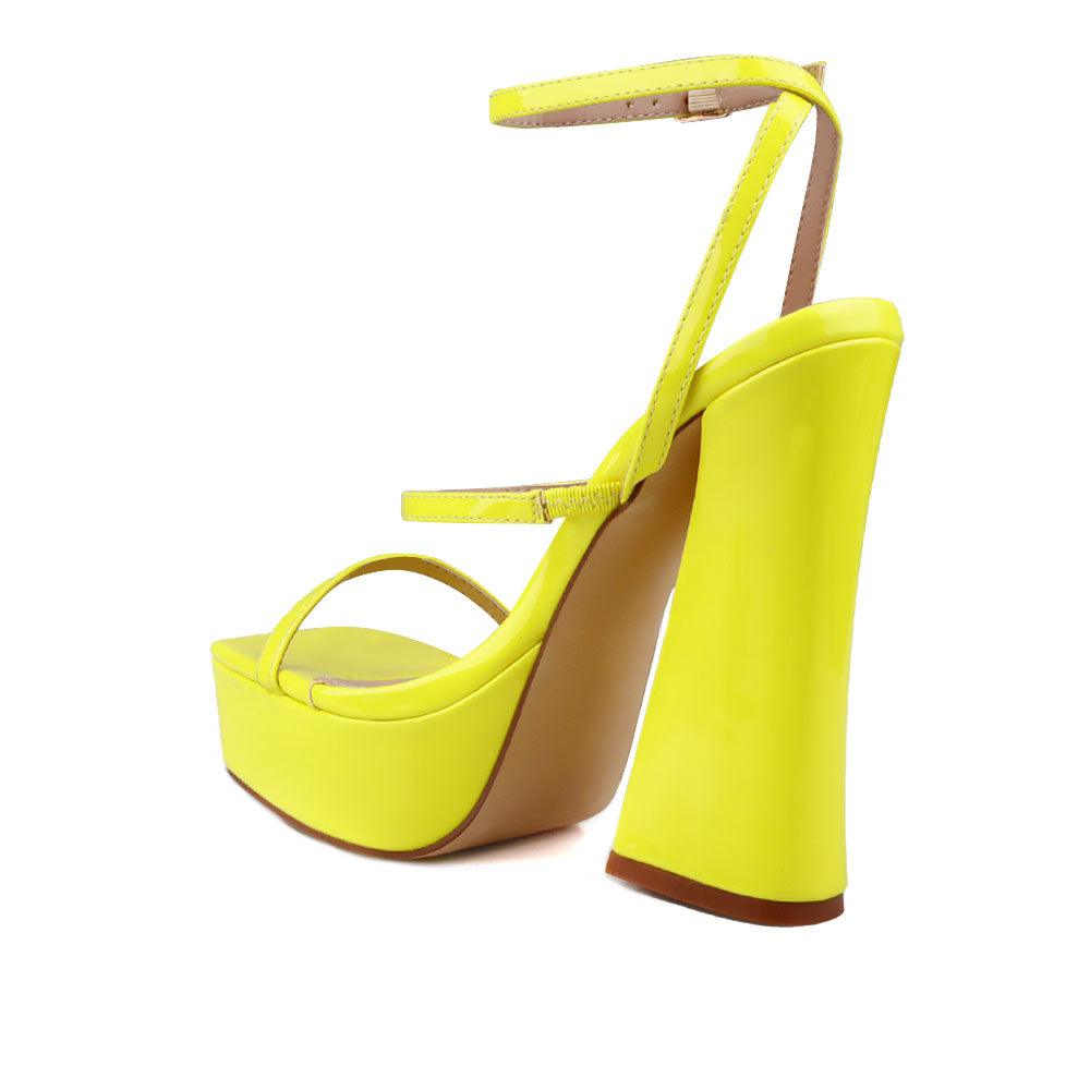 Neon yellow women's block heel with platform-posterior view