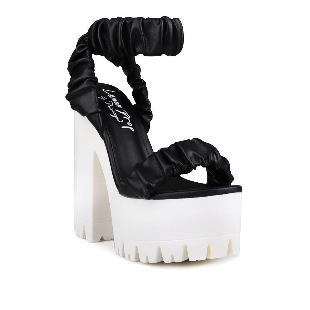 Women platform heels with velcro strap in black-corner view