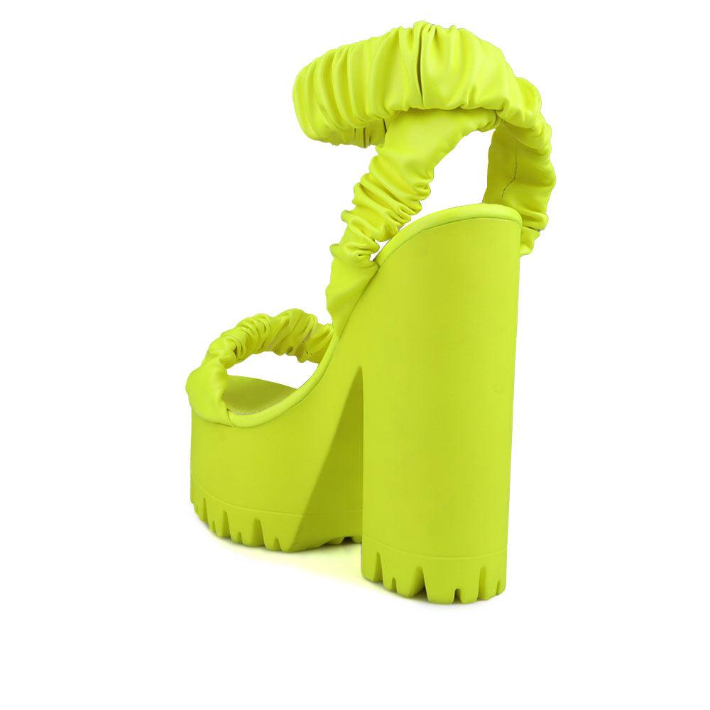 Women platform heels with velcro strap in neon yellow-posterior view