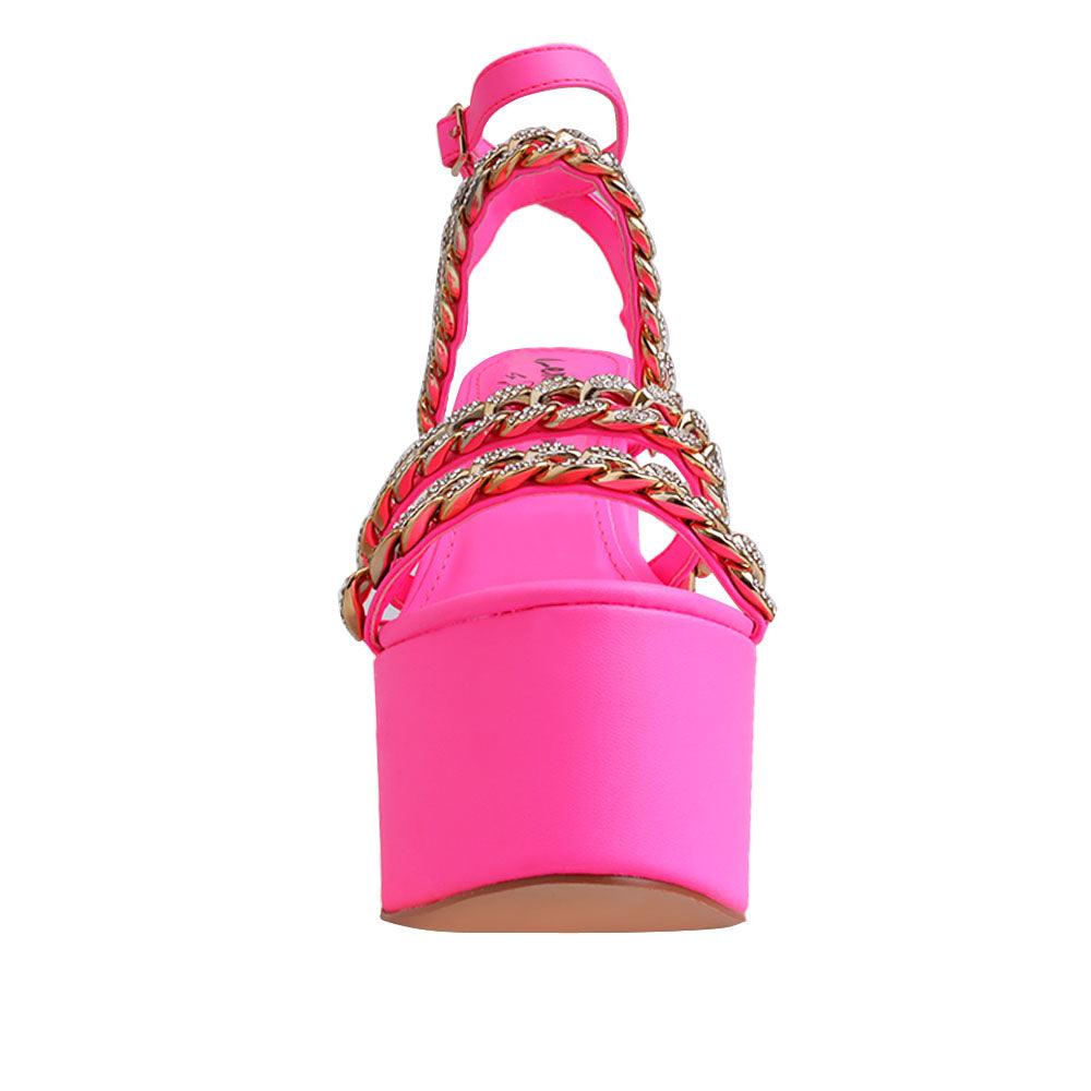 Pink colored women platforms with golden chain straps-front view