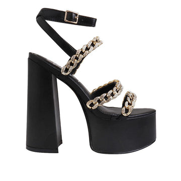 Black colored women platforms with golden chain straps-side view