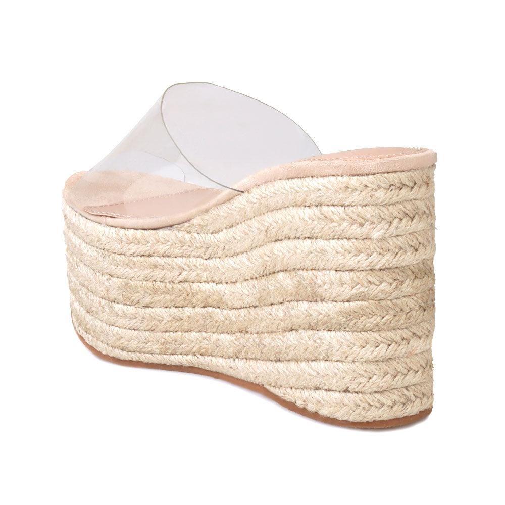 Nude colored women platforms with clear vinyl upper-posterior view