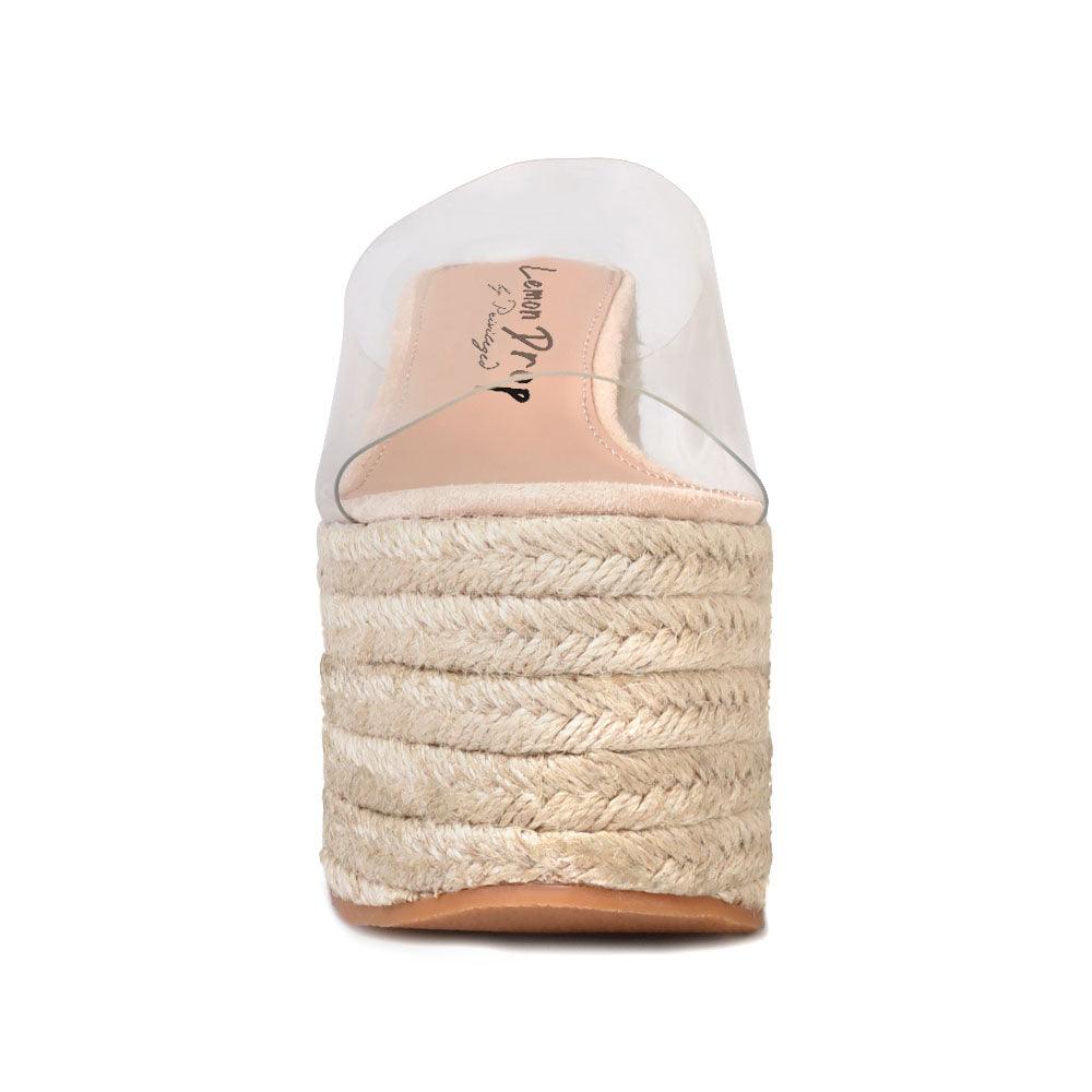 Nude colored women platforms with clear vinyl upper-front view