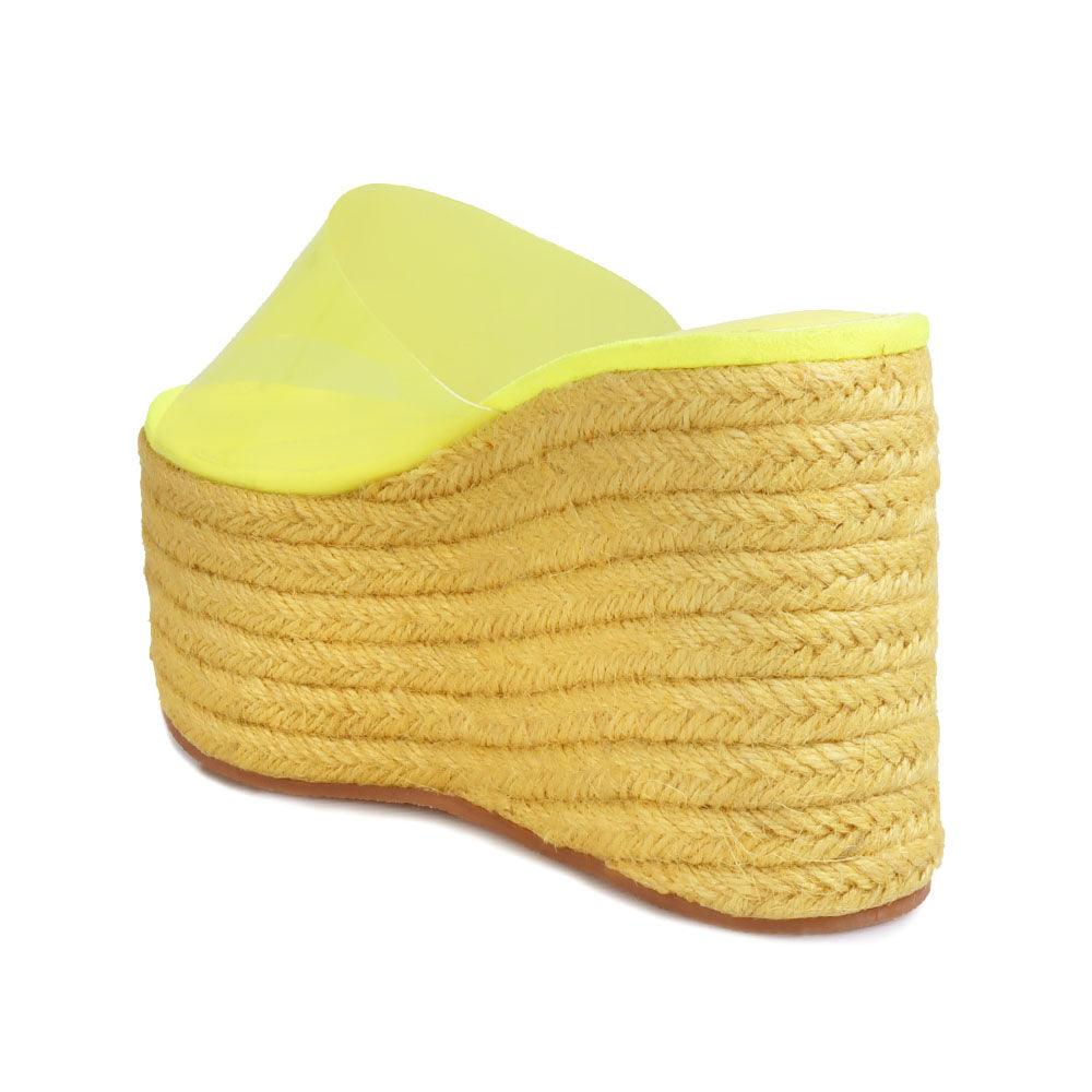 yellow colored women platforms with clear vinyl upper-posterior view