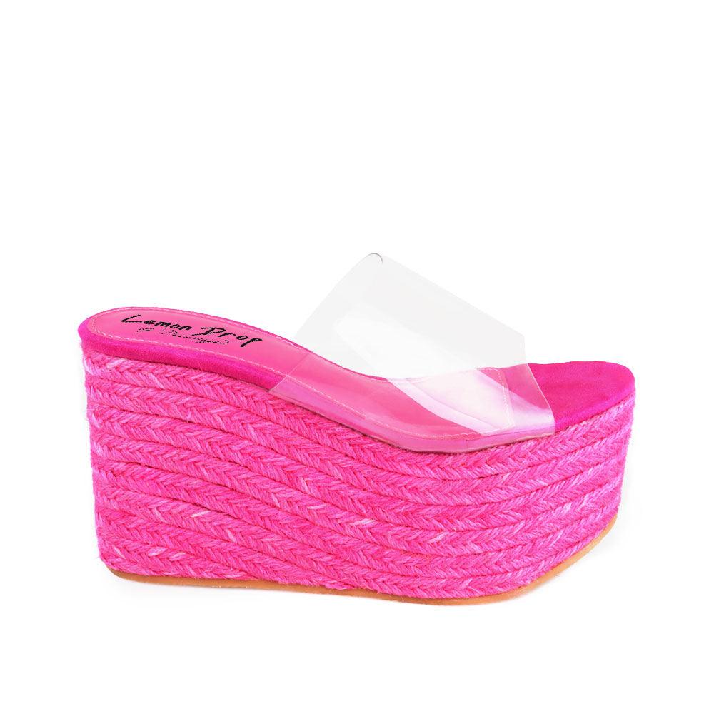 Pink colored women platforms with clear vinyl upper-side view