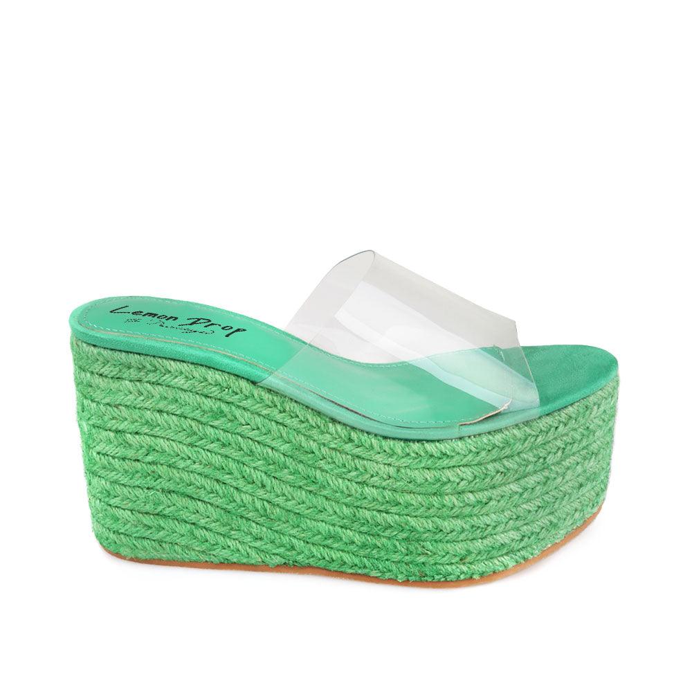 Green colored women platforms with clear vinyl upper-side view