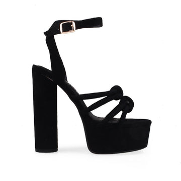 Black colored women heels with ankle buckle closure and two upper straps