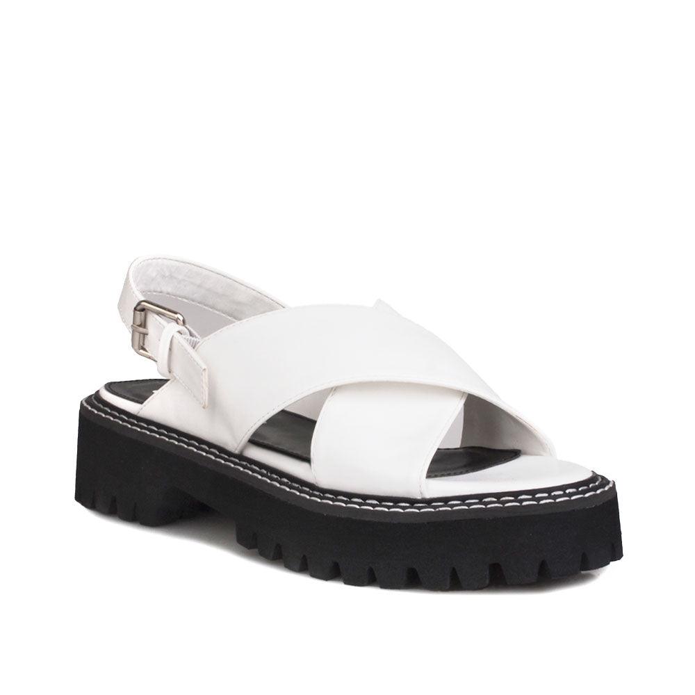 White women platforms with ankle buckle-corner view