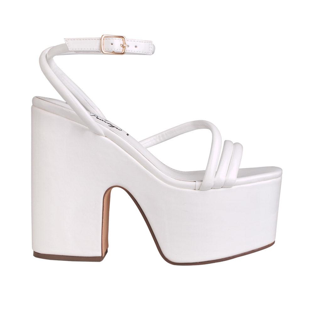 White colored women platform heels with ankle buckle closure-side view