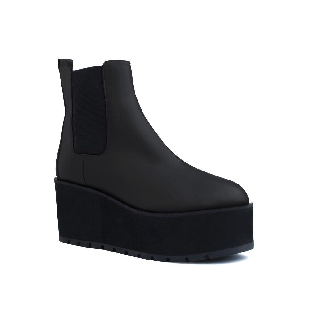 Black colored women booties with black platform-corner view