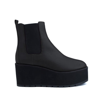 Black colored women booties with black platform-side view