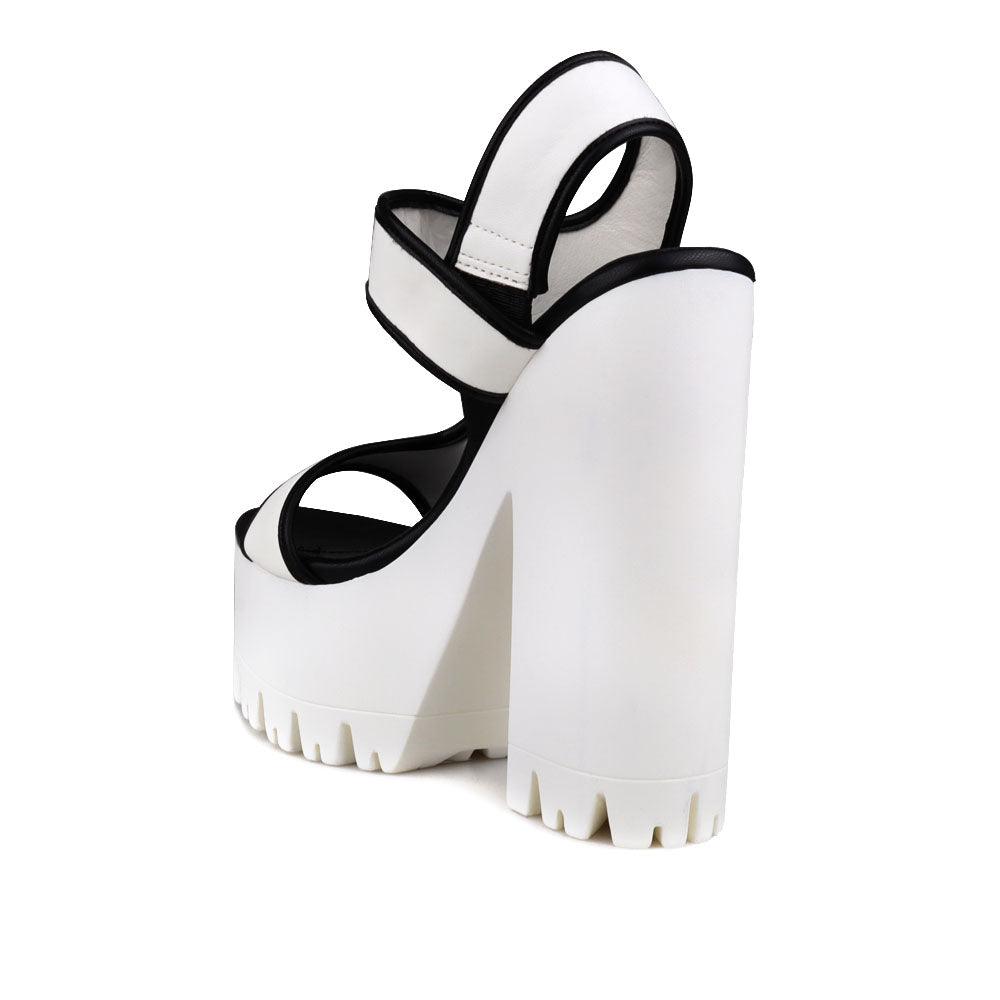 Black and white women platform heels-posterior view