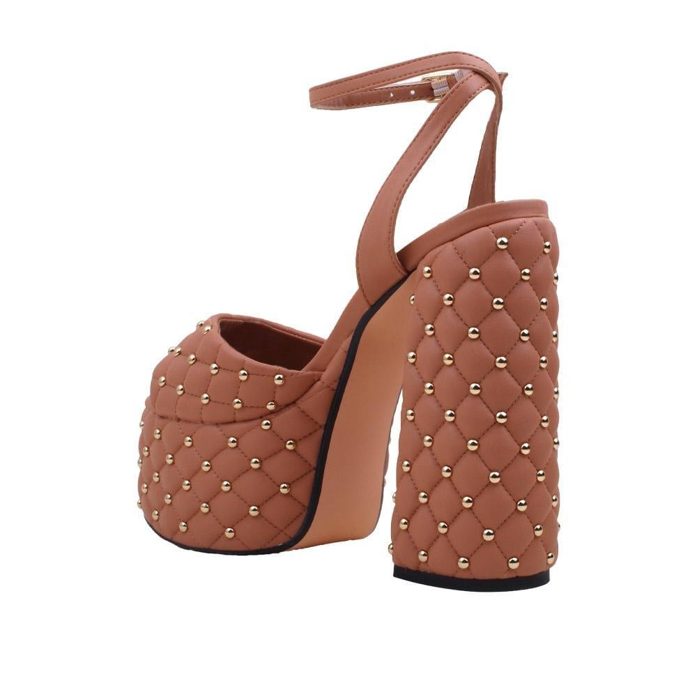 Vegan leather women's block heel with studs in nude-posterior view