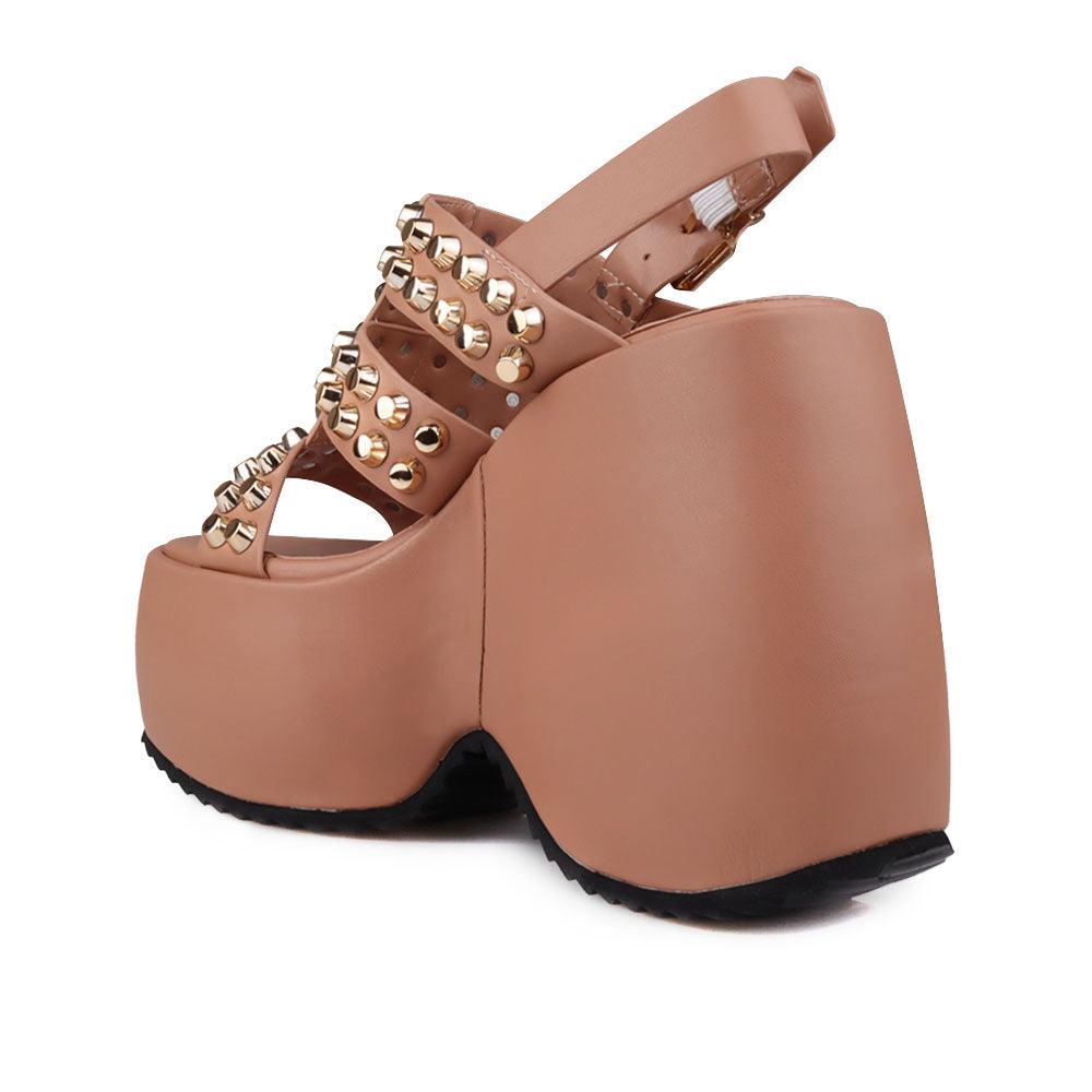 Vegan leather women wedge shoes with studs in nude-posterior view