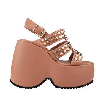Vegan leather women wedge shoes with studs in nude-side view