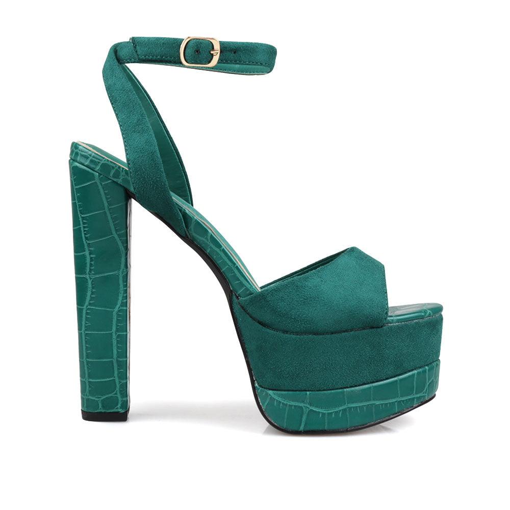 Platforms in green color with block heels and ankle buckle clasp