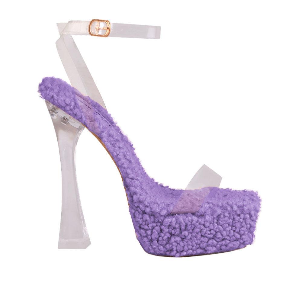 Platform heels with translucent ankle buckle clasp and purple shearling upper