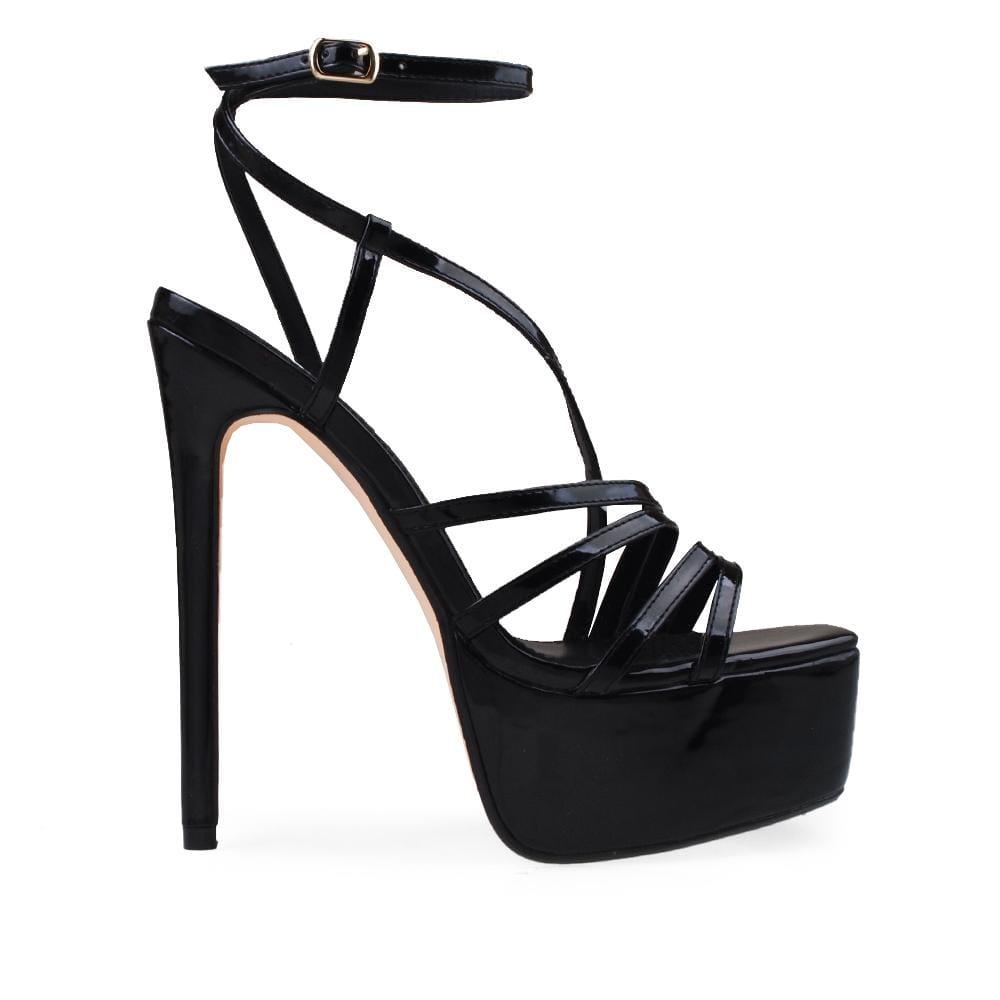 Platforms with stiletto heels, ankle buckle clasp and tie strap design in black