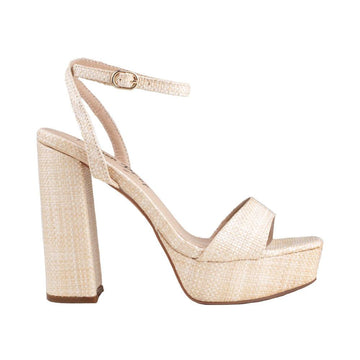 Natural-colored platforms with block heels and ankle buckle clasp.