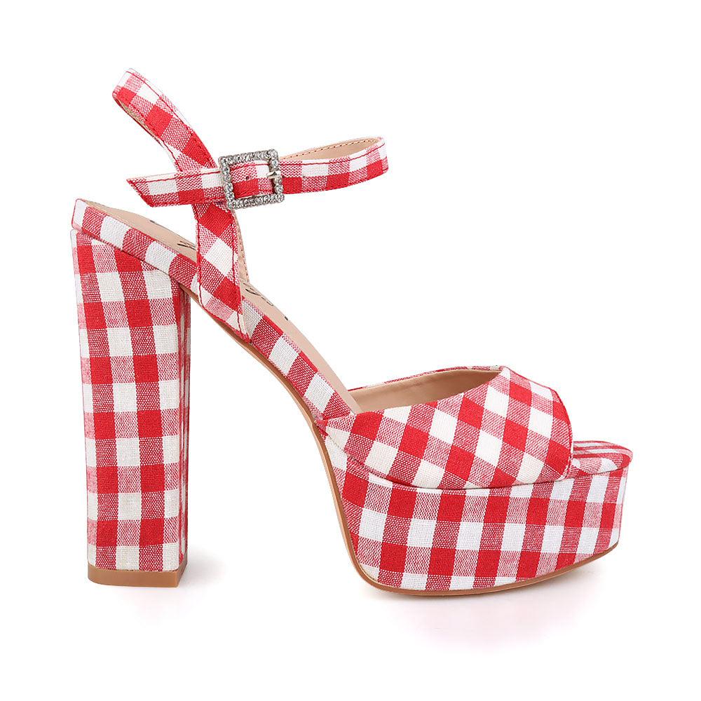 Women's platform heels with red-white pattern and an ankle buckle closure.