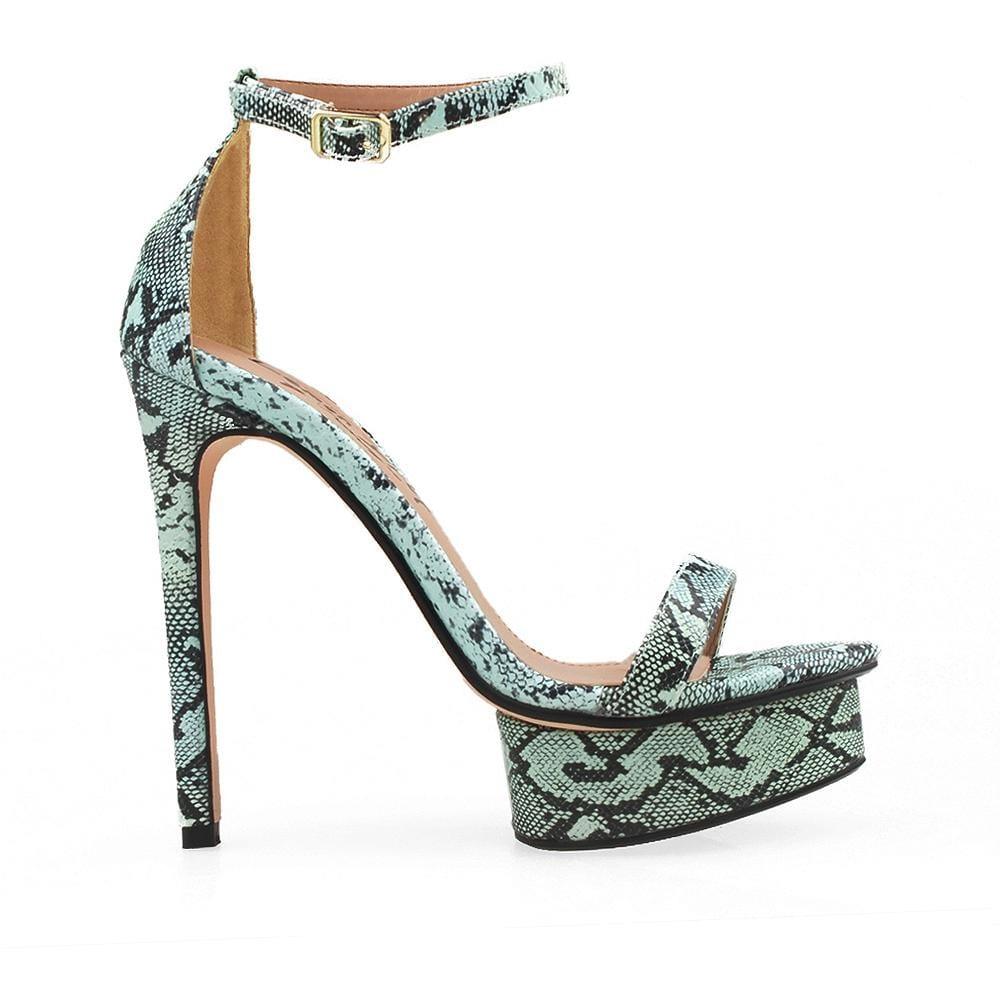 Women's mint snake-patterned heels with an open toe and ankle buck closure.