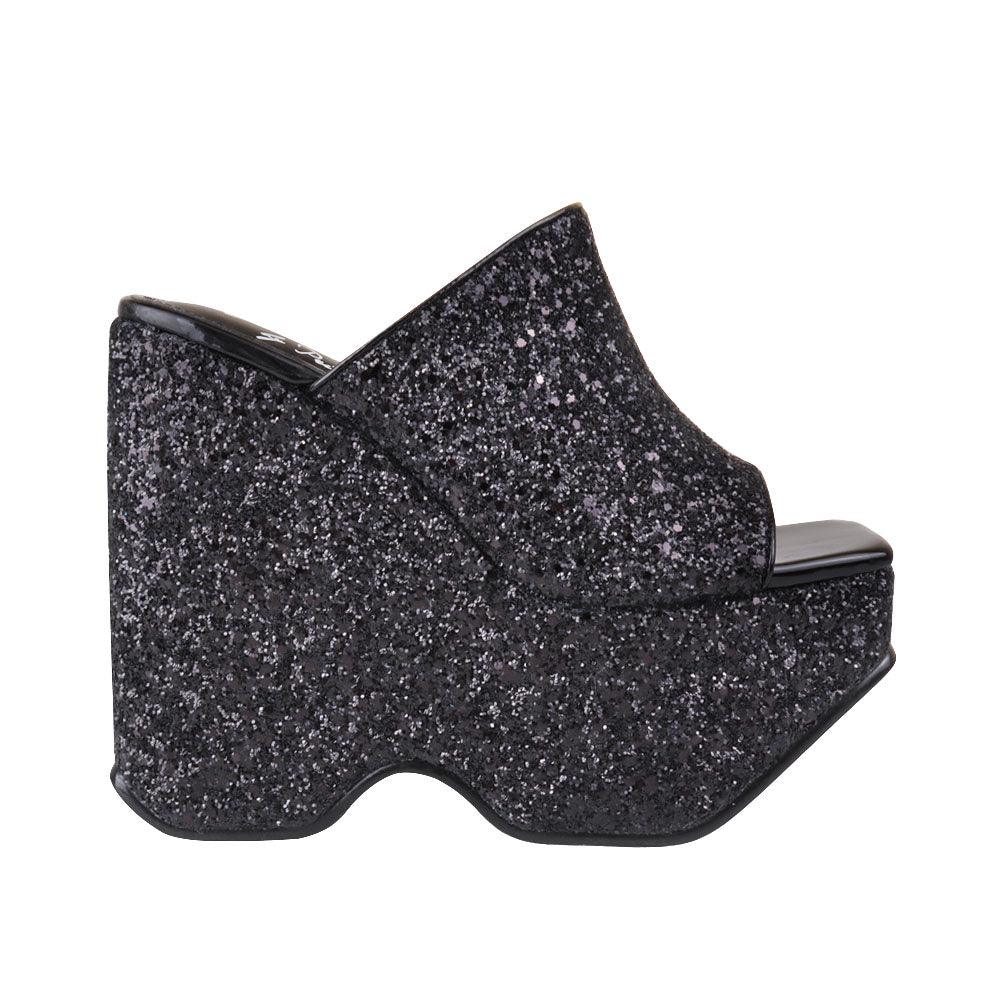 Black colored platform shoes with slip on design and glittery shine